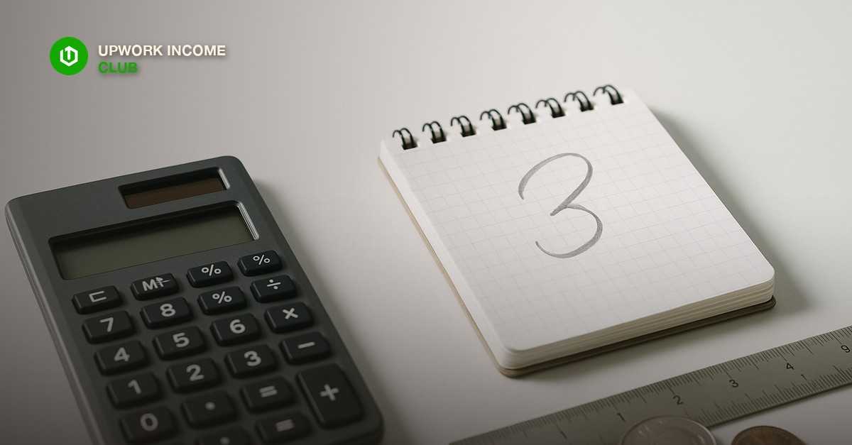 Upwork Income Club - setting your first Upwork hourly rate with a calculator and notepad